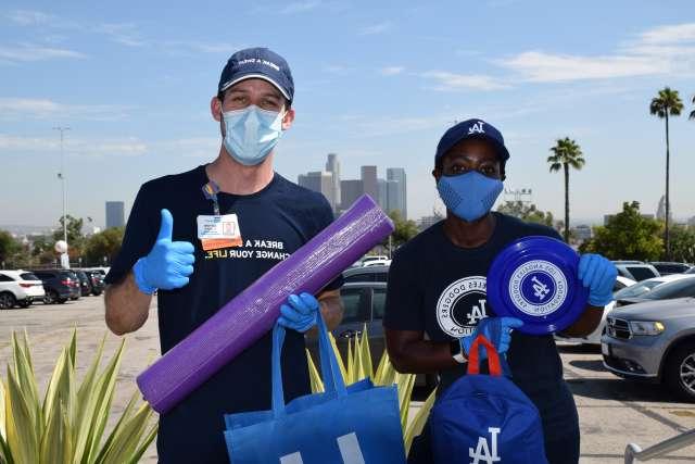 UCLA Health and the Dodgers Foundation distribute home PE kits to underserved youth